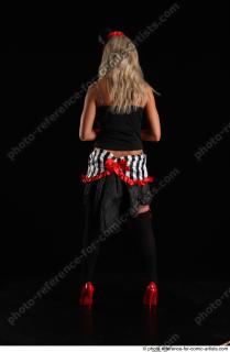 CHRISTY STANDING POSE WITH RED APPLE